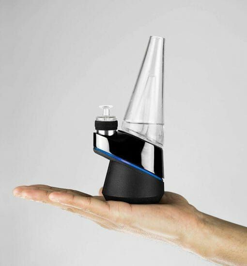 puffco peak smart vaporizer held in hand