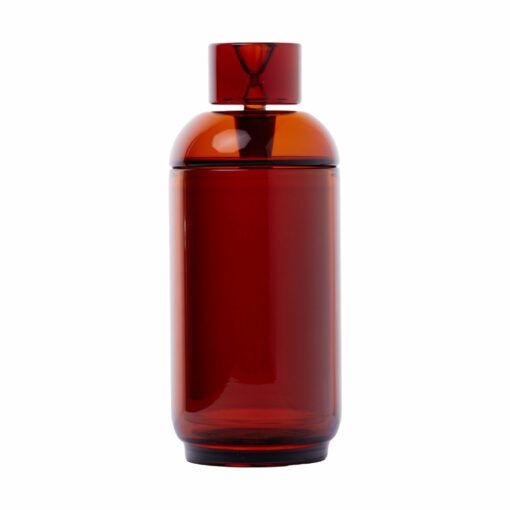 The NWTN Home Vesper Gravity Pipe is a tall, cylindrical, transparent amber glass bottle with a matching round cap, shown against a plain white background.