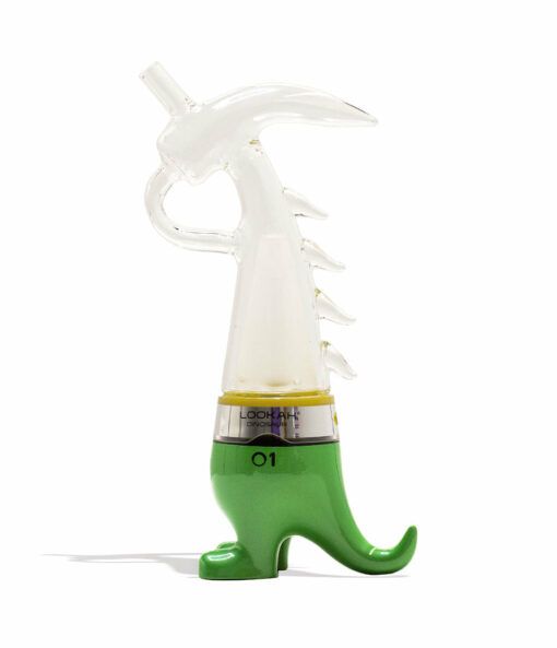 The Lookah Dinosaur Electronic Dab Rig features a dragon-shaped glass pipe with a clear upper body, green feet, curling tail, and white spikes on its back. The unique design stands out, and the bottom section is labeled “01.”.