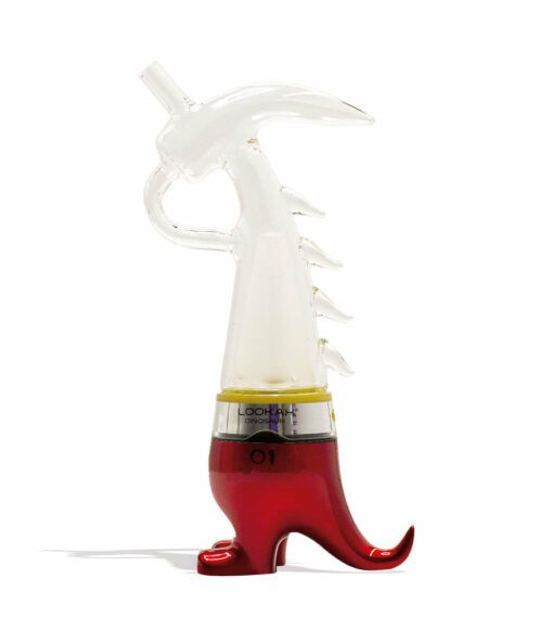 The Lookah Dinosaur Electronic Dab Rig is a clear glass piece with clawed feet and a curled tail, sitting on a metallic red and yellow base labeled 01 near the bottom.