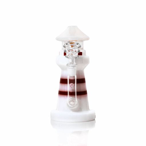 The Lighthouse Bong is a glass piece shaped like a white lighthouse with red stripes and a clear glass section in the middle, shown on a white background.