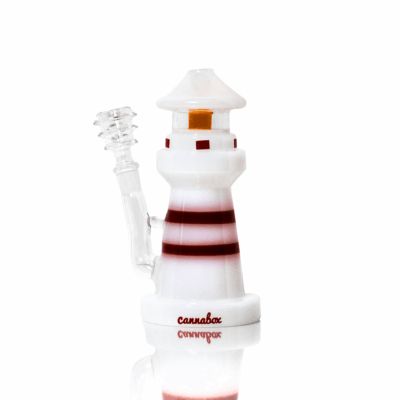 The Lighthouse Bong is a white and red bong shaped like a lighthouse, with a cylindrical body, attached glass bowl, and "cannabox" in red at the base.