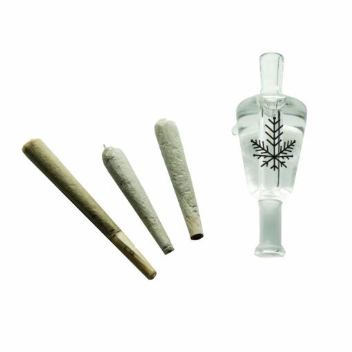 Three rolled joints rest beside a clear Freeze Pipe Glycerin Blunt Tip, which showcases a black snowflake design, all set against a white background.