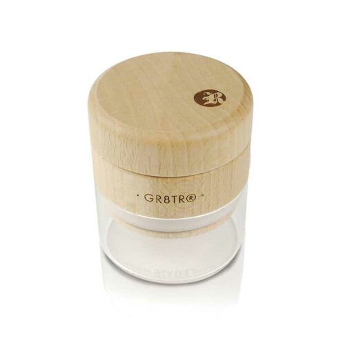 The WOOD GR8TR WITH JAR BODY features a clear glass jar labeled GR8TR and a round light wood lid with an engraved logo, displayed on a white background.