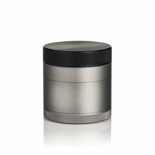 The RYOT 4PC SOLID BODY GRINDER is a durable metal, cylindrical grinder with a textured lid and base, brushed finish, and solid construction, shown against a white background.