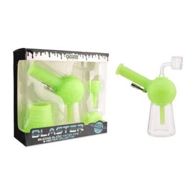 A neon green Ooze Blaster Silicone Glass 4-in-1 Hybrid Water Pipe and Dab Straw is shown next to its box, which features images of the device, dab straw, and included accessories.