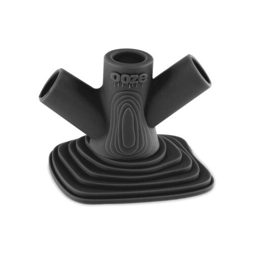 The Ooze Banger Hanger Silicone Banger Stand is black with a geometric design, featuring three angled tube openings, concentric layered patterns on a square base, and “ooze” embossed on the front.