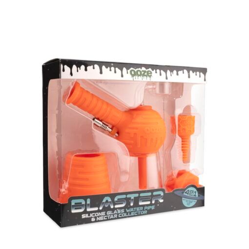 A boxed set labeled Ooze Blaster Silicone Glass 4-in-1 Hybrid Water Pipe and Dab Straw features orange silicone and glass parts; packaging displays the water pipe design, all components, and brand name.