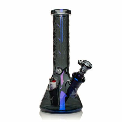 The Gear Premium 12" Sidekick Beaker (Terminator Finish) Water Pipe features a dark glass body, patterned neck, angled downstem and bowl, side-attached lighter, and stunning blue and purple reflections.