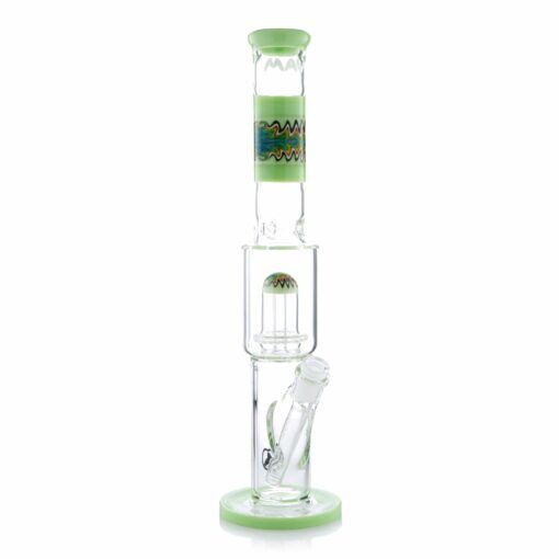 The Wig Wag Reversal UFO Straight is a clear glass water pipe with light green accents, a sturdy base, a decorative colorful wig wag band near the top, a cylindrical chamber, and a side mouthpiece.