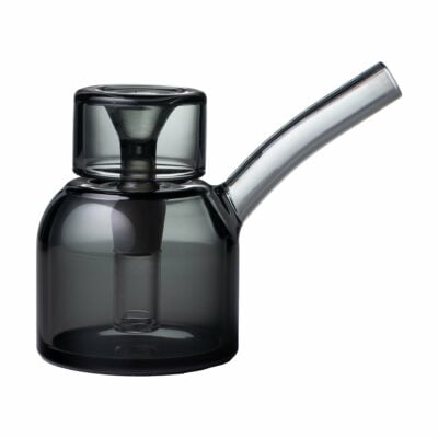The NWTN Home Vesper Bubbler is a sleek, modern teapot with a short spout, cylindrical body, matching lid, and tinted smoky gray glass for a stylish, minimalist look.