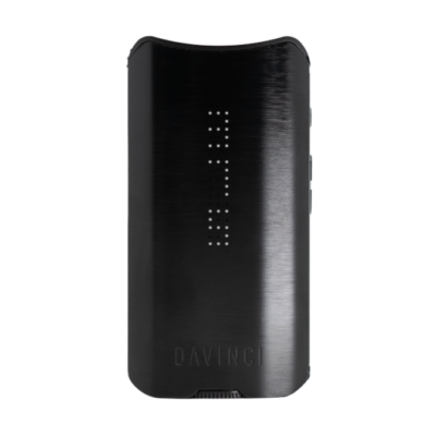 The DAVINCI IQ3 Vaporizer features a sleek black rectangular design with a brushed metal finish, small front LED display dots, three side buttons, and “DAVINCI IQ3” engraved at the bottom.