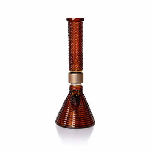 The Jane West x Prism Bong - Amber features textured amber glass, a beaker base, cylindrical neck, gold accent band, and bowl piece, shown on a white background.