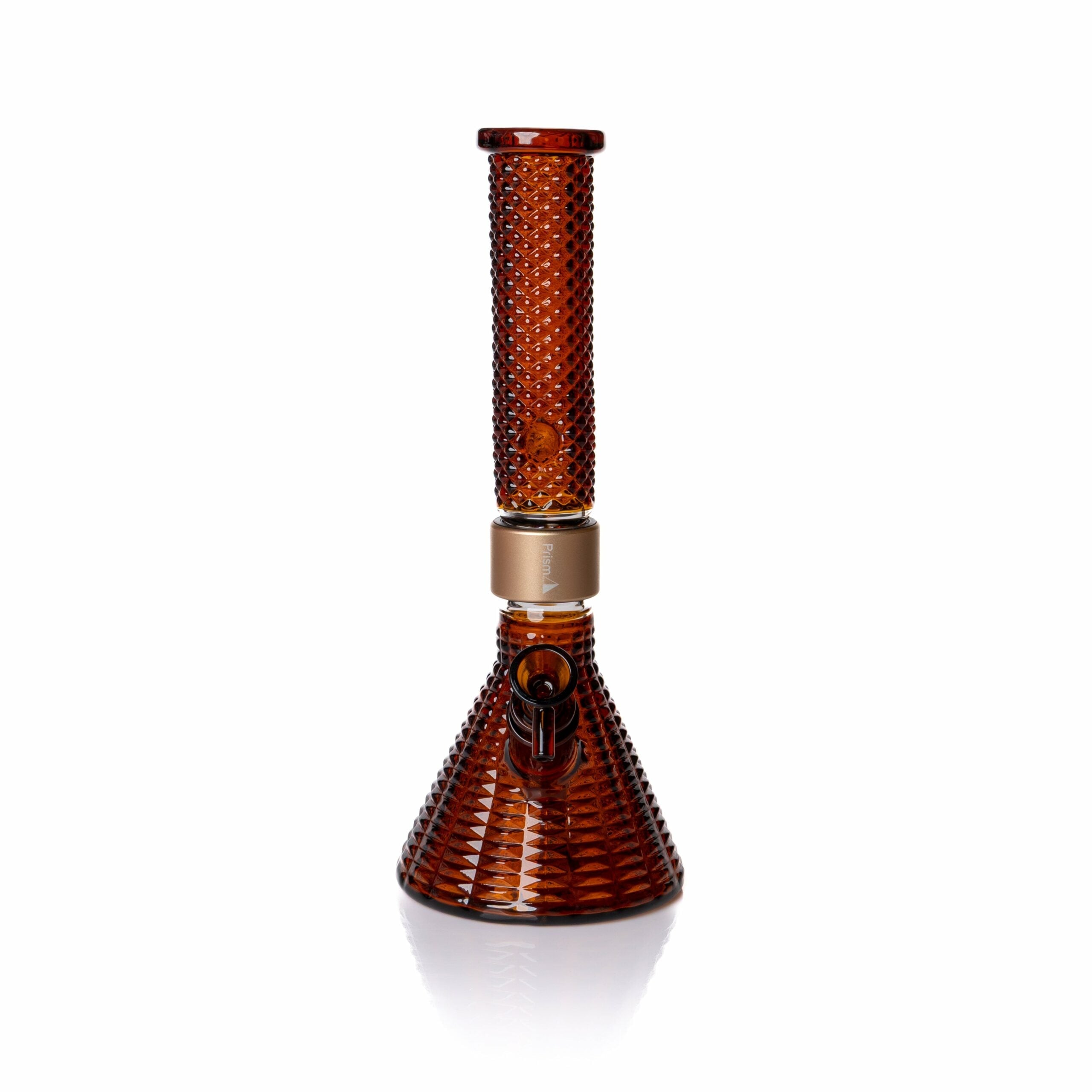The Jane West x Prism Bong - Amber features textured amber glass, a beaker base, cylindrical neck, gold accent band, and bowl piece, shown on a white background.