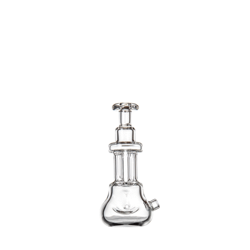 The MJ Arsenal Tetra is a clear glass bong featuring a wide base, straight neck, and side opening, shown on a plain white background—ideal for fans of sleek, modern designs.