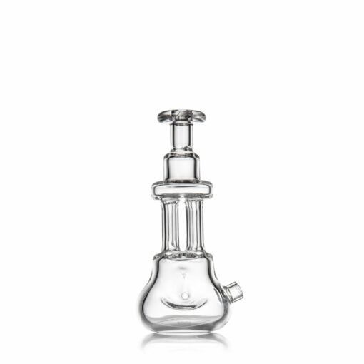 The MJ Arsenal Tetra, a clear glass water pipe with a wide base, cylindrical neck, and small angled mouthpiece, is displayed against a plain white background.