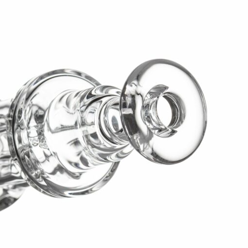 Close-up of the MJ Arsenal Tetra, a clear glass piece with circular and cylindrical forms, showcasing its wide, round opening against a white background.
