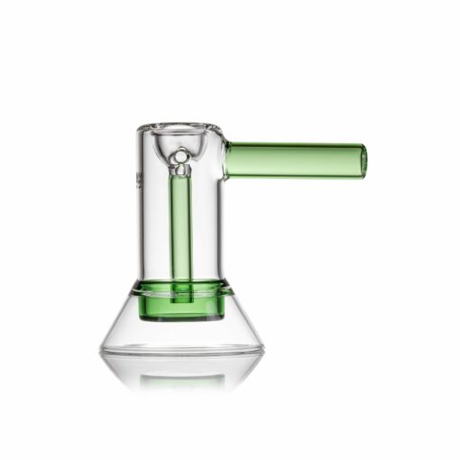 The MJ Arsenal Cove Glass Bubbler has a clear glass body with a conical base, a green straight mouthpiece, and an internal green vertical tube. It is shown photographed on a white background.