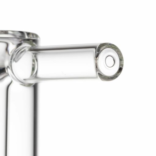 Close-up of the MJ Arsenal Cove Glass Bubbler’s clear glass spout, photographed against a white background. The image showcases its smooth, transparent surface and round opening.