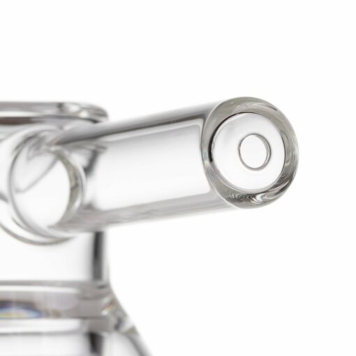 Close-up of the MJ Arsenal Grotto Glass Pipe spout, extending from the glass body against a white background. The image highlights its smooth, cylindrical, and transparent design.