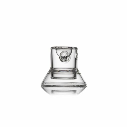 The MJ Arsenal Grotto Glass Pipe stands upright on a reflective white surface with a minimalistic background, making it an ideal display piece for collectors.