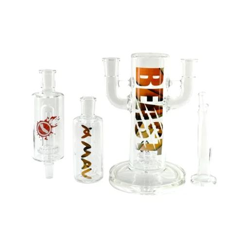 The Beast Bubbler Combo set features clear glass cylindrical and tube-shaped smoking accessories, labeled "BEAST" and "A MAN," all arranged on a white background.