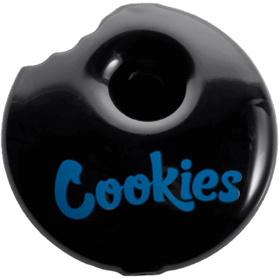 The Cookies Bite Pipe is a black, circular piece with a bite taken out, a central hole, and "Cookies" written in blue on its surface.
