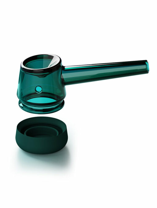 Displayed against a white background, the Forge [Emerald] glass smoking pipe floats above its matching round base. Featuring a translucent emerald hue, cylindrical bowl, and elongated stem, it resembles artfully crafted glasswork.