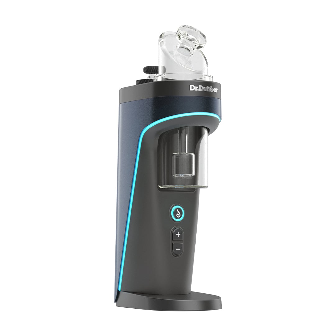 The Dr Dabber Switch 2 is a sleek black electronic vaporizer with blue LED accents, featuring a cylindrical glass chamber on top and front control buttons. It's pictured upright on a flat base.