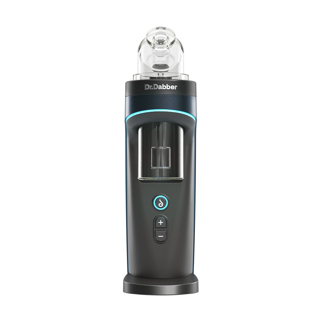 The Dr Dabber Switch 2 vaporizer features a stylish black and silver design with a clear glass top, labeled Dr. Dabber. It includes a circular power button, two adjustment buttons, and a window for the heating chamber.