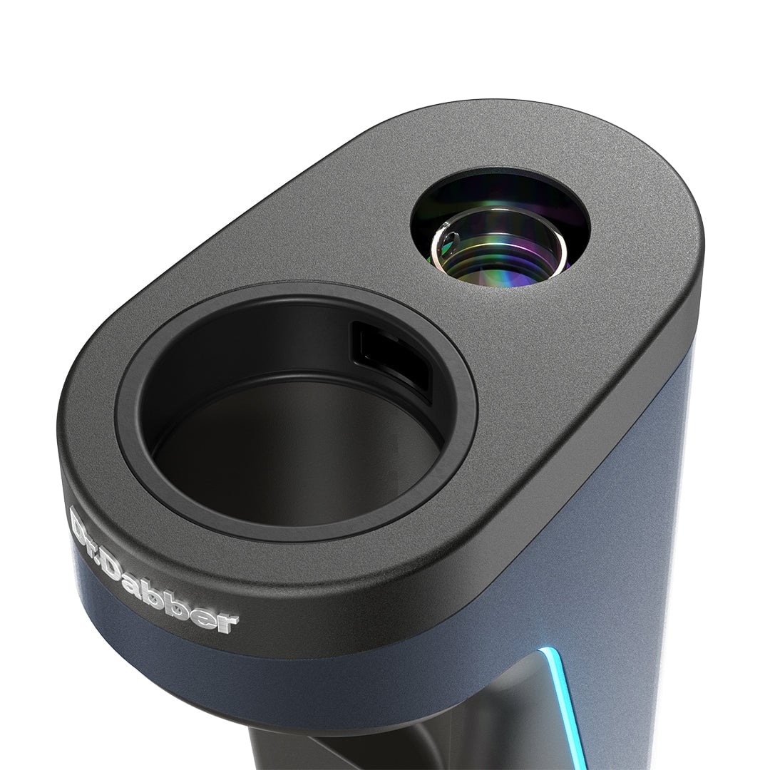 Close-up of the sleek Dr Dabber Switch 2, showcasing its circular black chamber and lens-like opening. The Dr Dabber brand name is prominent on the front of its gray, oval-shaped body.