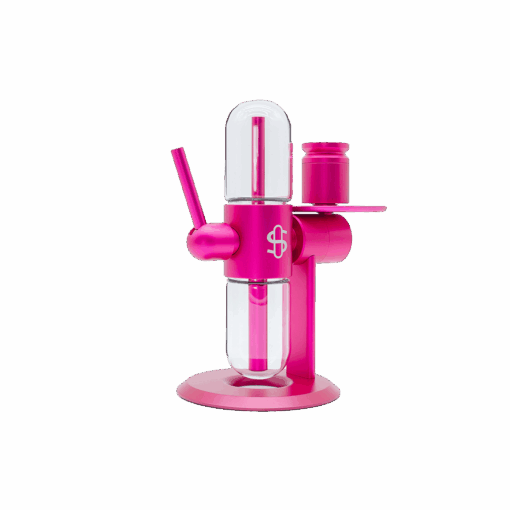 The Stündenglass Kompact Gravity Infuser - Pink features cylindrical glass chambers, a vertical mouthpiece, horizontal handle, and round base, showcased against a plain white background.