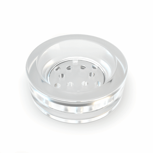 A pink transparent lid with multiple central holes, designed for ventilation or straining, fits the Stündenglass Kompact Gravity Infuser - Pink. The round plastic/glass lid is shown on a plain white background.