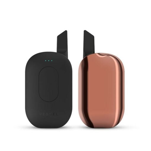 The Compass [Copper] + is a sleek, modern vape with a shining metallic copper finish, LED indicator lights, and an upright mouthpiece—a stylish companion for your vaping journey.