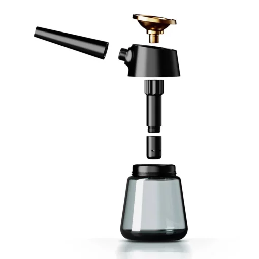 An exploded view of the Element [Black] oil sprayer showcases its nozzle, pumping mechanism, and transparent glass container, all separated against a white background.