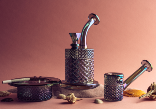 The Twenties Collection Ashtray | Mermaid is displayed on sandy terrain with seashells, creating a dreamy, mermaid-inspired vibe against a peach-colored background.