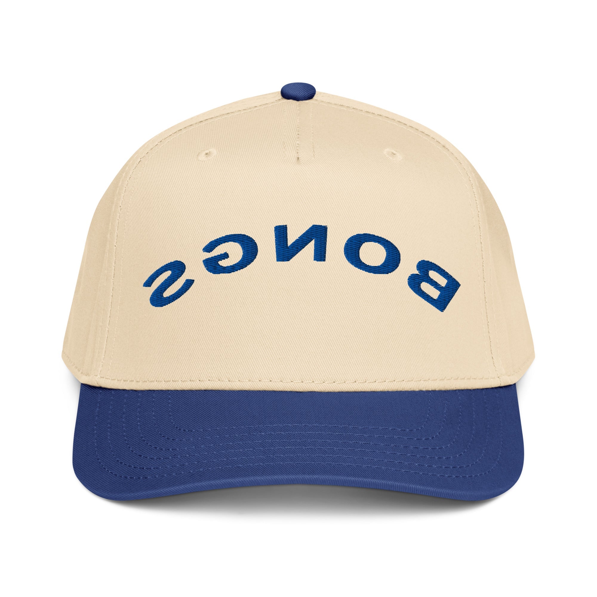 The 5 panel cap SGNOB is beige with a blue bill and features "SGNOB" embroidered upside down in blue letters on the front.