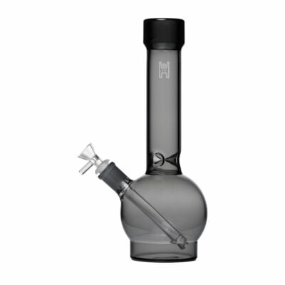 The Human Grade 12" Ball Water Pipe features translucent gray glass, a straight cylindrical neck, round base, and includes a Human Grade downstem plus a side-angled bowl.