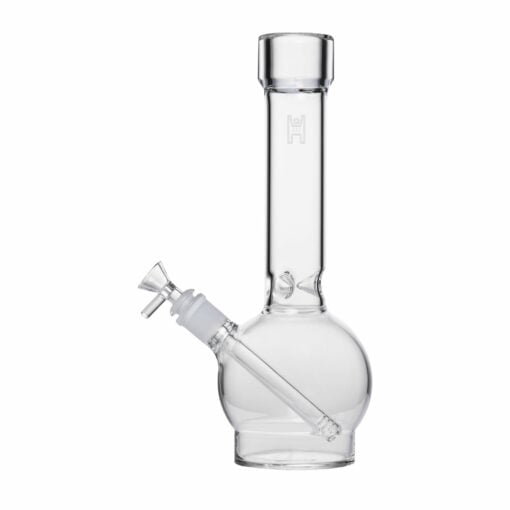 The Human Grade 12" Ball Water Pipe features a clear glass design with a round base, straight neck, and angled downstem. It stands upright on a white background—ideal for those seeking high-quality water pipe experiences.