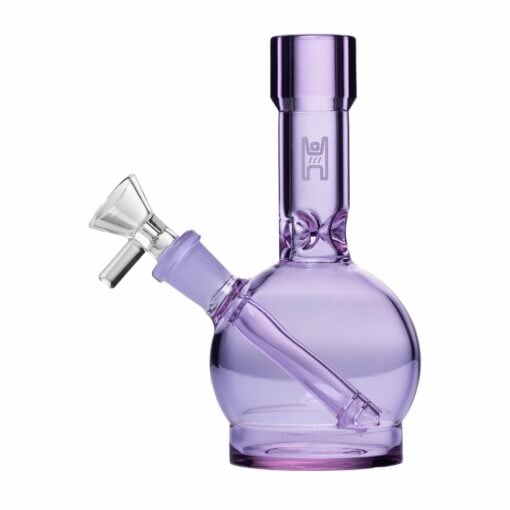 The Human Grade 6" Ball Water Pipe features a small, round-bottomed design in light purple with a short neck and clear glass bowl and downstem—a stylish choice for any collection.