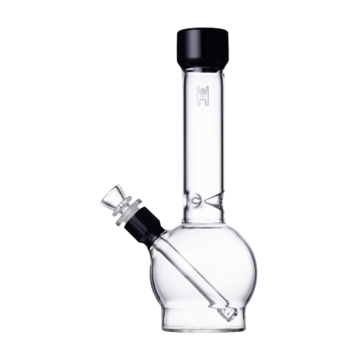The Human Grade 12" Ball Water Pipe is a clear glass bong with a round base, straight neck, black mouthpiece, slanted removable bowl, and a subtle logo on the transparent neck.