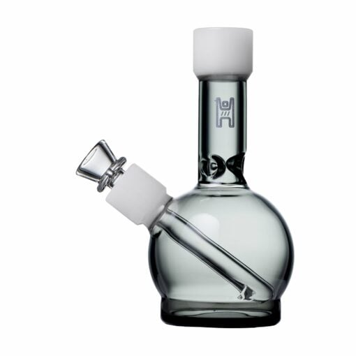 The Human Grade 6" Ball Water Pipe is made of clear glass and features a round base, angled mouthpiece, straight downstem, bowl attachment, and a logo on the neck for added style.