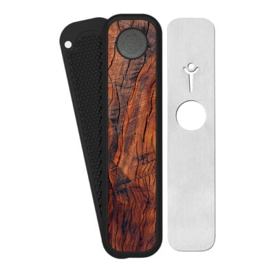 The High Roller Mahogany Genius Pipe features a black grip, mahogany wood-textured center inspired by the Genius Pipe, and a removable silver cover with a circular opening and stick figure logo.