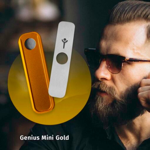 A bearded man in sunglasses stands beside an image of the Gold Mini Genius Pipe, shown in gold and silver with a slim, rectangular design. A circular gold gradient serves as the background.