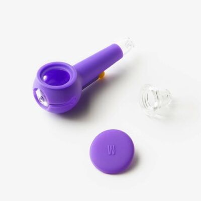 The Pipe - Grape features a grape-colored silicone body, a clear glass bowl with a removable glass piece, and a matching purple silicone lid, all shown on a white background.