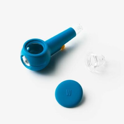 The Pipe - Midnight is a midnight blue pipe with a round chamber, matching blue lid, and clear detachable mouthpiece, displayed on a white background.