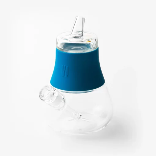 The Pipe - Hot Pink is a clear glass water pipe with a wide base, hot pink silicone neck band, glass mouthpiece, and angled side bowl attachment, showcased on a white background.