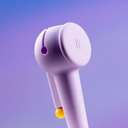 A close-up of The Pipe - Lavender, a sleek modern gadget with a pipe-shaped round top and a small yellow button, set against a gradient purple background. Its minimalistic design stands out in lavender.