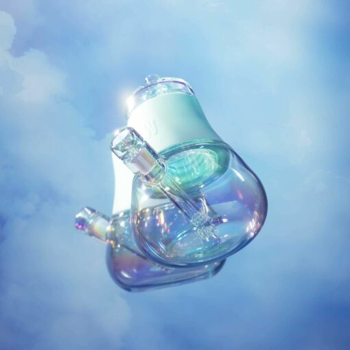 The Bubbler Iridescent - Sky: a pair of glass laboratory flasks with iridescent reflections and clear stoppers float gracefully against a dreamy blue sky with soft clouds.