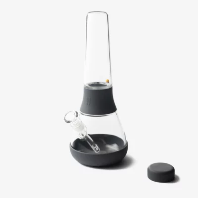 The Bong - Smoke is a modern glass bong with a black silicone base and midsection, glass bowl, and matching black lid on the right side, displayed on a plain white background—perfect for your next smoke session.